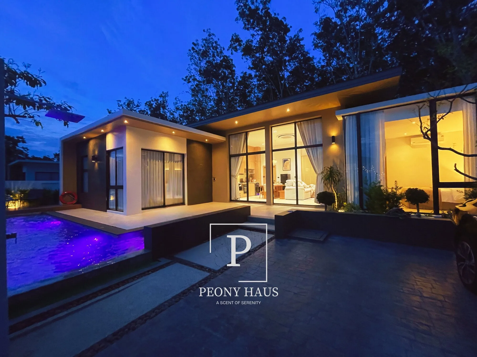 Peony Haus pool villa at night